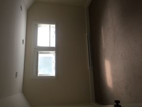 Surrey apartment for rent - A window in a room with a white wall.