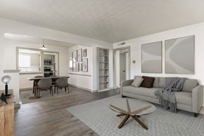 Dallas apartment for rent - a living room with a couch and a table