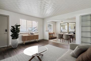 Dallas apartment for rent - a living room with a couch and a table
