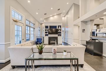 Germantown apartment for rent - a living room with a white couch and a glass table