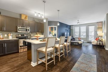 Germantown apartment for rent - an open kitchen and living room with a table and chairs