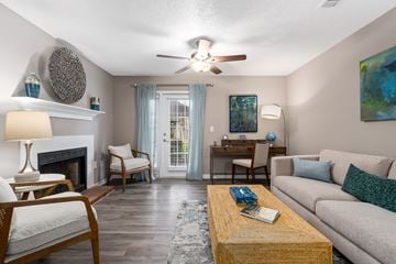 Fairhope apartment for rent - a living room with a couch and a coffee table
