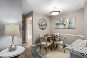 Fairhope apartment for rent - a dining room with a table and chairs