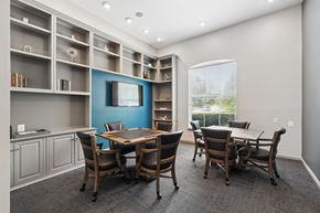 Pikesville apartment for rent - A conference room with a long table and chairs.