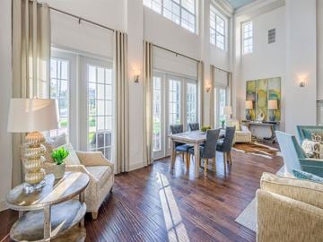 Tallahassee apartment for rent - a living room and dining room with a table and chairs