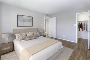 Woodbridge apartment for rent - Renovated unit bedroom with wood-designed flooring at  Springwoods at Lake Ridge