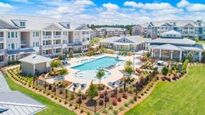 Augusta apartment for rent - Aerial view of The Highland apartment community with resort-style swimming pool and amenities in Augusta, GA