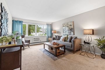 Bloomington apartment for rent - a living room with a couch and a table