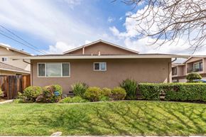 Campbell apartment for rent - a brown house with a lawn in front of it