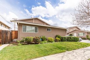 Campbell apartment for rent - a house with a lawn and a sidewalk in front of it