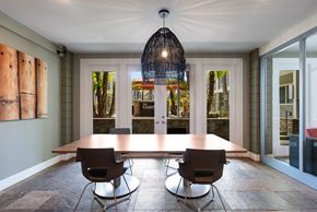 Goleta apartment for rent - A dining room with a wooden table and chairs.