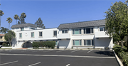 Camarillo apartment for rent - a white building with a parking lot in front of it