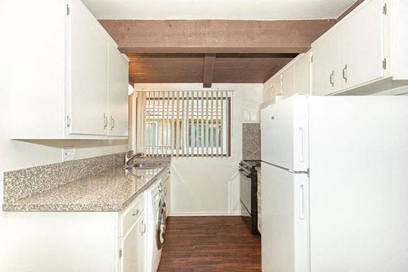 Camarillo apartment for rent - a white kitchen with white appliances and white cabinets