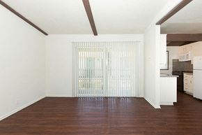 Camarillo apartment for rent - an empty living room with a door to a kitchen