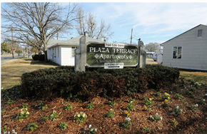 Charlotte apartment for rent - the sign in front of the plaza triangle apartments