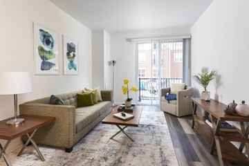 Iselin apartment for rent - a living room with a couch and a table and a window