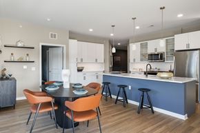 Warren apartment for rent - Open concept kitchen and dining area with bar seating at Aster Grove Apartments, New Jersey