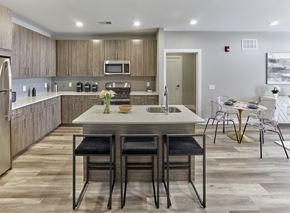 Bayonne apartment for rent - an open kitchen and dining area with a table and chairs