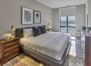 Bayonne apartment for rent - a bedroom with a large bed and a window