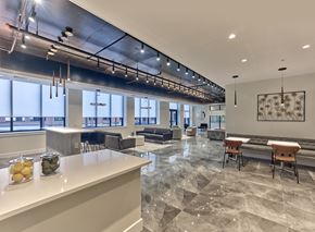 Linden apartment for rent - Communal area with a bar and tables at The Hartlan, Linden, New Jersey