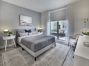 Raritan apartment for rent - a bedroom with a bed and a desk and a window