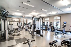 Verona apartment for rent - Fitness center with cardio machines and strength training equipment at Highlands at Hilltop Apartments, Verona, 07044
