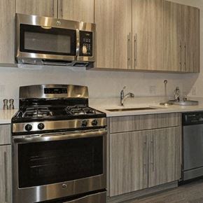 Englewood apartment for rent - a kitchen with a stove and a microwave