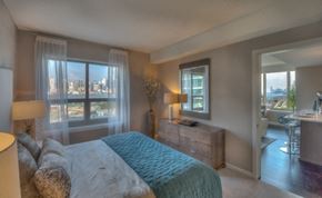 Weehawken apartment for rent - Bedroom with city skyline views at RiverParc Apartments, New Jersey