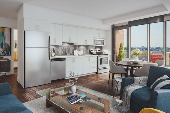 Ottawa apartment for rent - a living room with a kitchen and a table