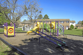 Virginia Beach townhouse for rent - On-site playground at Lynnhaven Landing Apartments, offering a safe and fun space for families in Virginia Beach