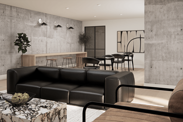 Kelowna apartment for rent - A modern living room with a black leather couch and a marble coffee table.
