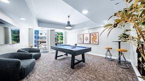 Colwood apartment for rent - A room with a pool table and bar stools.