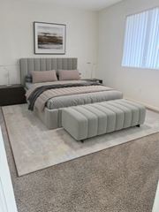 Sparks apartment for rent - A bedroom with a large bed and a framed picture on the wall at Boulder Creek Apartments, Nevada, 89433