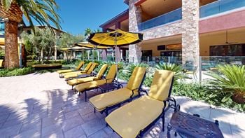 Shaded lounge area by pool