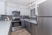 Las Vegas apartment for rent - a kitchen with stainless steel appliances and a refrigerator at Evoq Apartment Homes, Nevada  