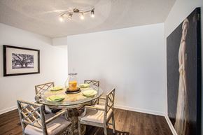 Hoover apartment for rent - A dining room with a glass table and chairs.