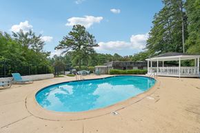 Hoover apartment for rent - A small pool with a pavement around it.