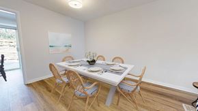 Birmingham apartment for rent - A dining room with a white table and chairs.