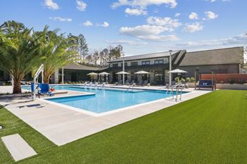 Swimming pool with relaxing sundecks