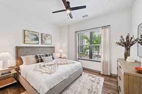 North Port triplex for rent - Living with couch at The Hadley - North Port, FL Apartments, North Port 34287
