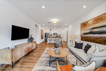 A living room with a couch and a tv
