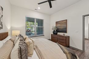 Sarasota apartment for rent - A bedroom with a large bed and a ceiling fan at The Concord Luxury Apartments, Sarasota, FL