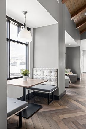 Monument apartment for rent - a dining room with a table and chairs and a large window at Alta25, Colorado