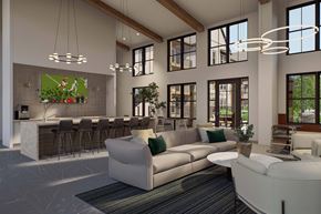 Longmont apartment for rent - A modern living room with a bar area and a large window.