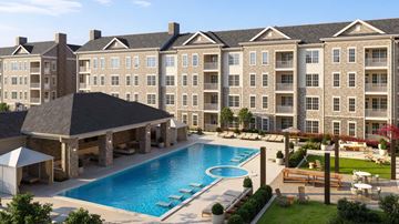 Westfield apartment for rent - A large building with a pool in front.