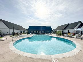 Wyoming townhouse for rent - a swimming pool at the resort on a sunny day at The BLVD at Wilson Crossings, Wyoming, MI 49418
