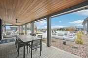 Fountain apartment for rent - a dining area with a table and chairs next to a sliding glass door at The Garrison Luxury Apartment Homes, Colorado, 80817