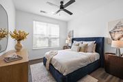 Vero Beach apartment for rent - A bedroom with a large bed and a ceiling fan at Verity Luxury Apartments, Vero Beach, 32960
