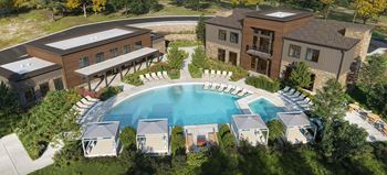 Resort style pool surrounded by modern apartment buildings