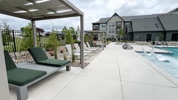 Our apartments have a large pool and lounge chairs